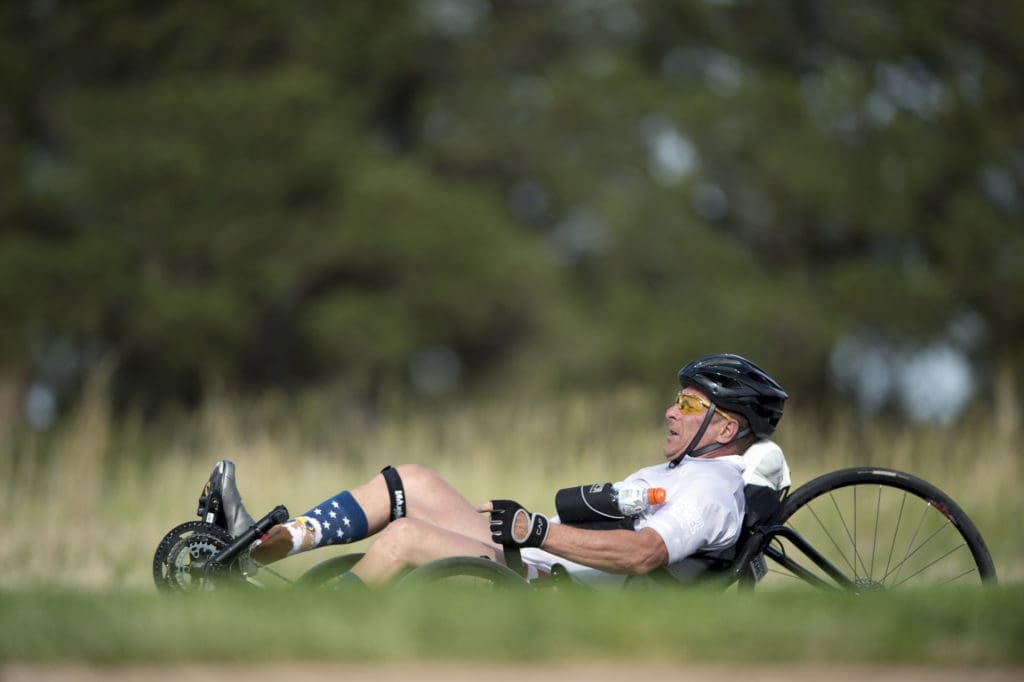 Team SOCOM Master Sgt. Curtis Allen pedals a recumbent cycle during the 2018 DoD Warrior Games cycling competition